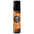 A roll-on bottle of Edens Garden Good Morning Essential Oil Blend with black cap and orange label.