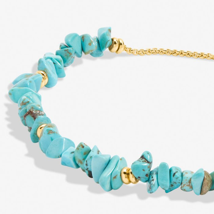 Turquoise Manifestones Adjustable Bracelet In Gold-Tone Plating